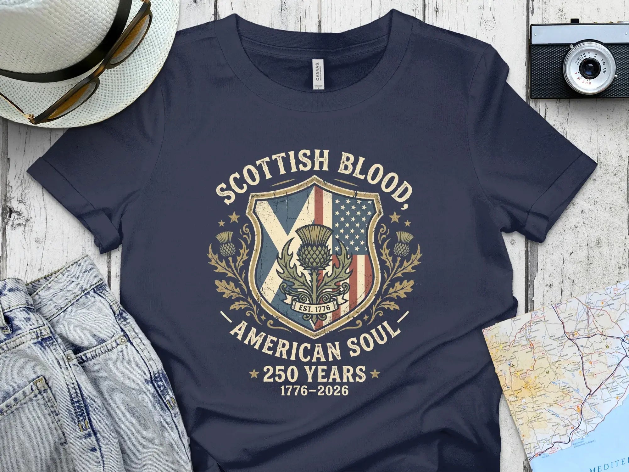 Navy t-shirt with Scottish and American flag design, "Scottish Blood, American Soul" text.