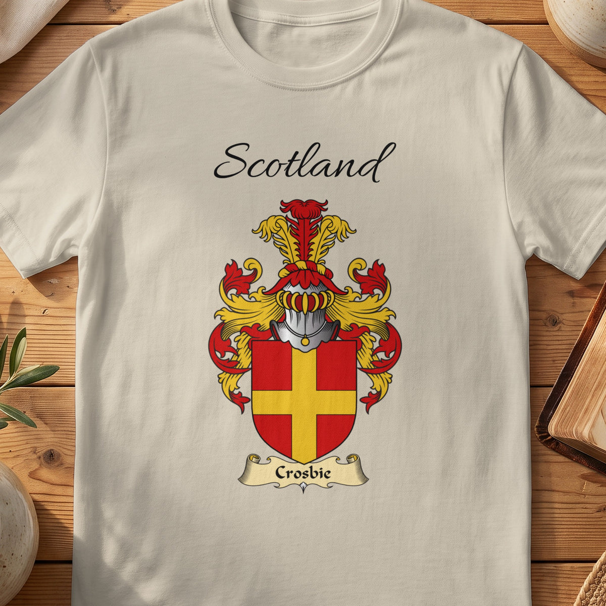 Sand Crosbie Scottish family shield T-shirt featuring a gold cross on a red shield
