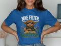 Highland cow wearing sunglasses and a scarf, text "Nae Filter Scottish".