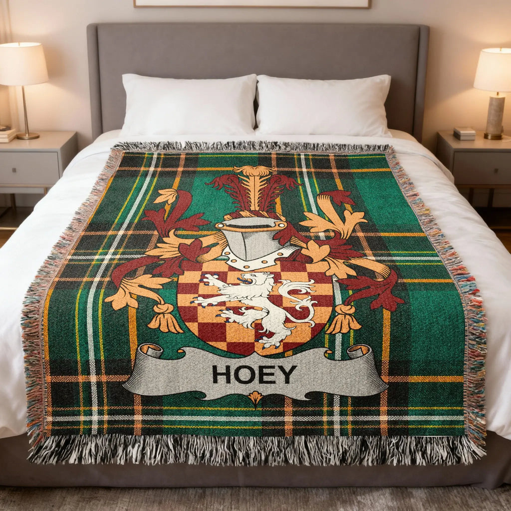 Plaid blanket with a lion crest and "HOEY" banner.