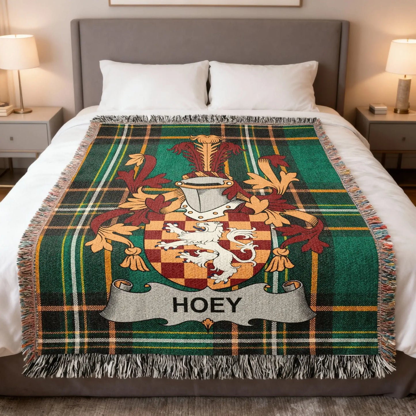 Plaid blanket with a lion crest and "HOEY" banner.