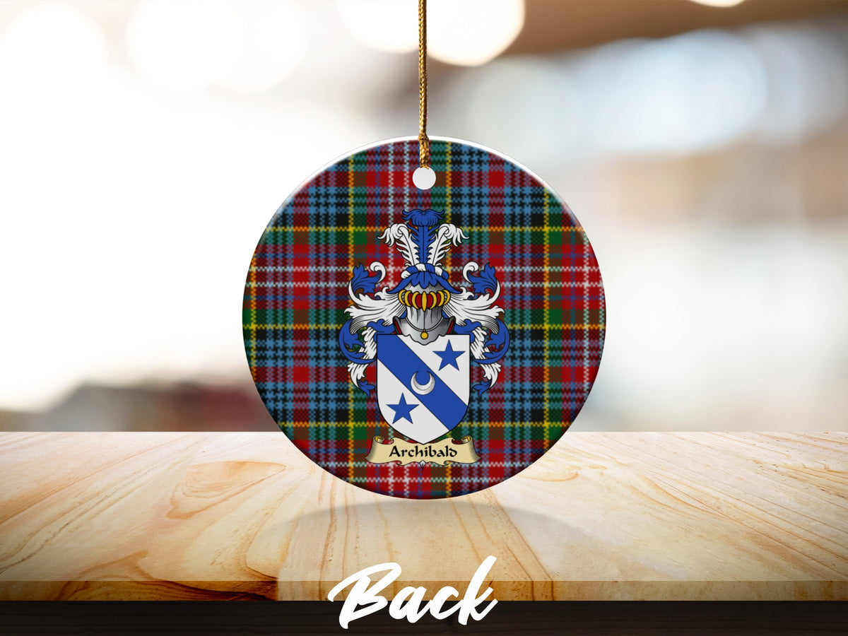 Round Archibald Scottish clan ornament with family crest on a Caledonia tartan background