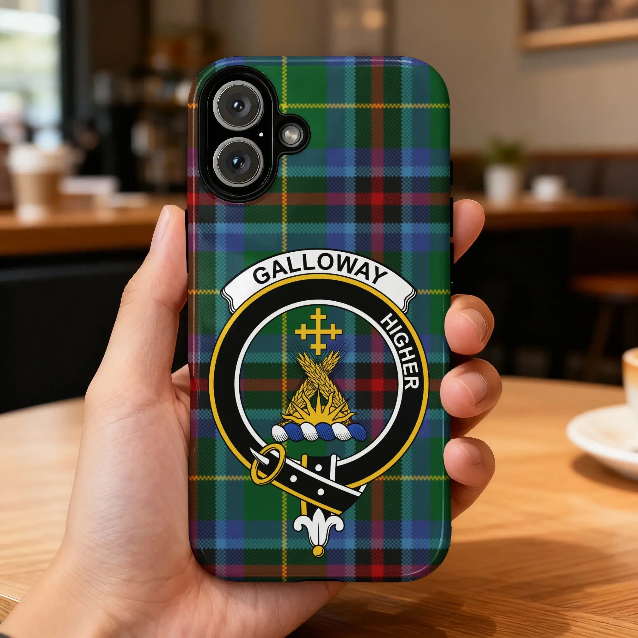 Clan Galloway crest tartan phone case — glossy full-wrap print with clan crest and Higher motto on iPhone