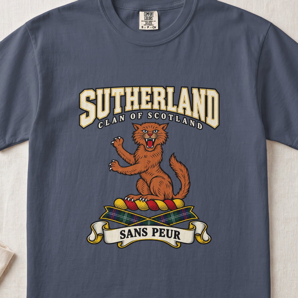 Sutherland graphic T-shirt in Midnight blue, front flat lay showing varsity lettering and orange-brown wildcat with raised paws and open mouth.