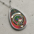Burnett clan Scottish tartan necklace with clan crest on tartan background