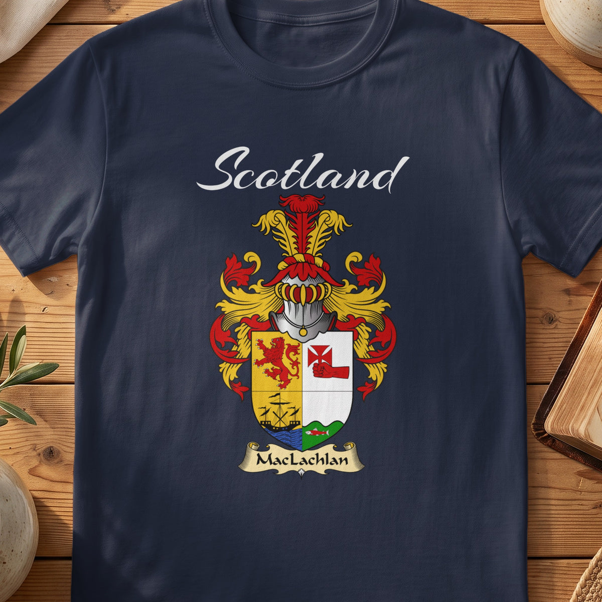 Navy MacLachlan family shield T-shirt featuring a quartered shield with a lion and sailing ship