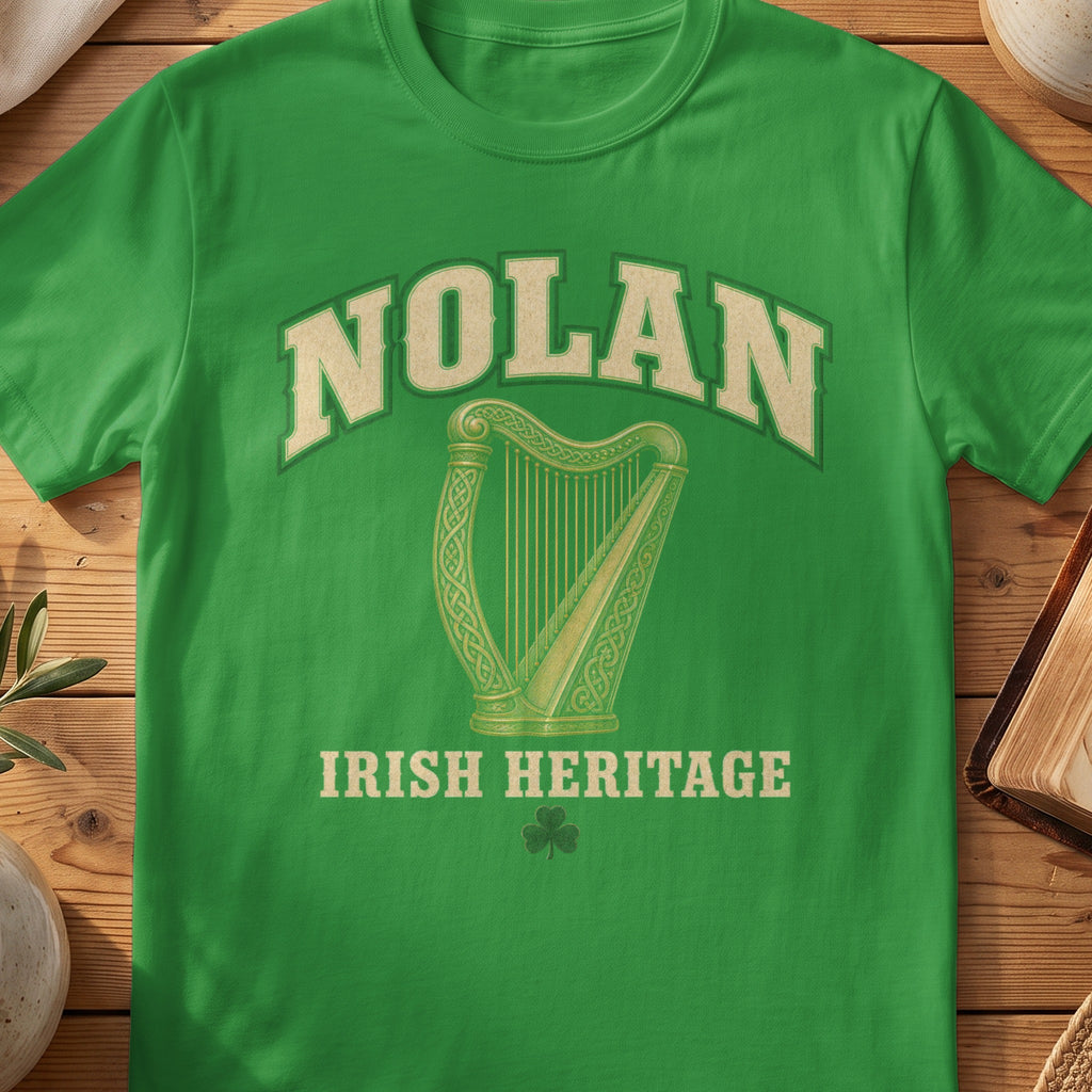 Nolan Irish harp T-shirt in Irish Green, with cream surname lettering, a gold-toned harp, green shamrock and “Irish Heritage” text.