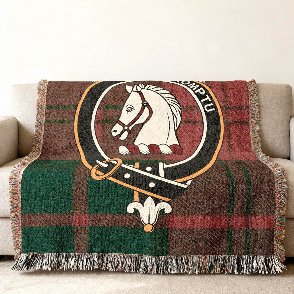 Dunbar woven blanket draped over sofa — 60x50 size, fringe edges and tartan detail