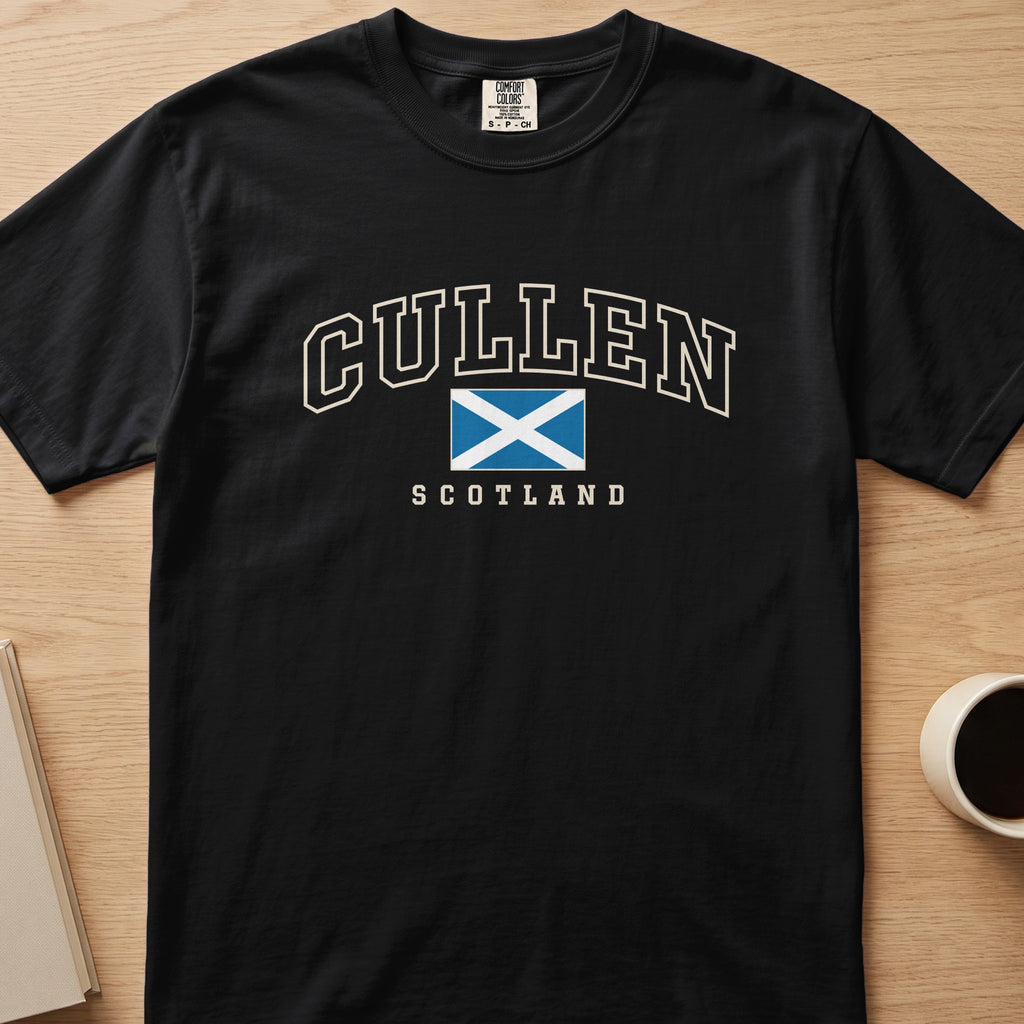 Black Cullen Scotland Comfort Colors T-shirt laid flat, showing cream lettering and the Saltire