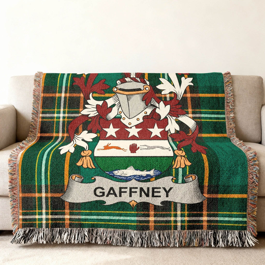 Green plaid throw blanket with Gaffney family crest centered on the fabric.