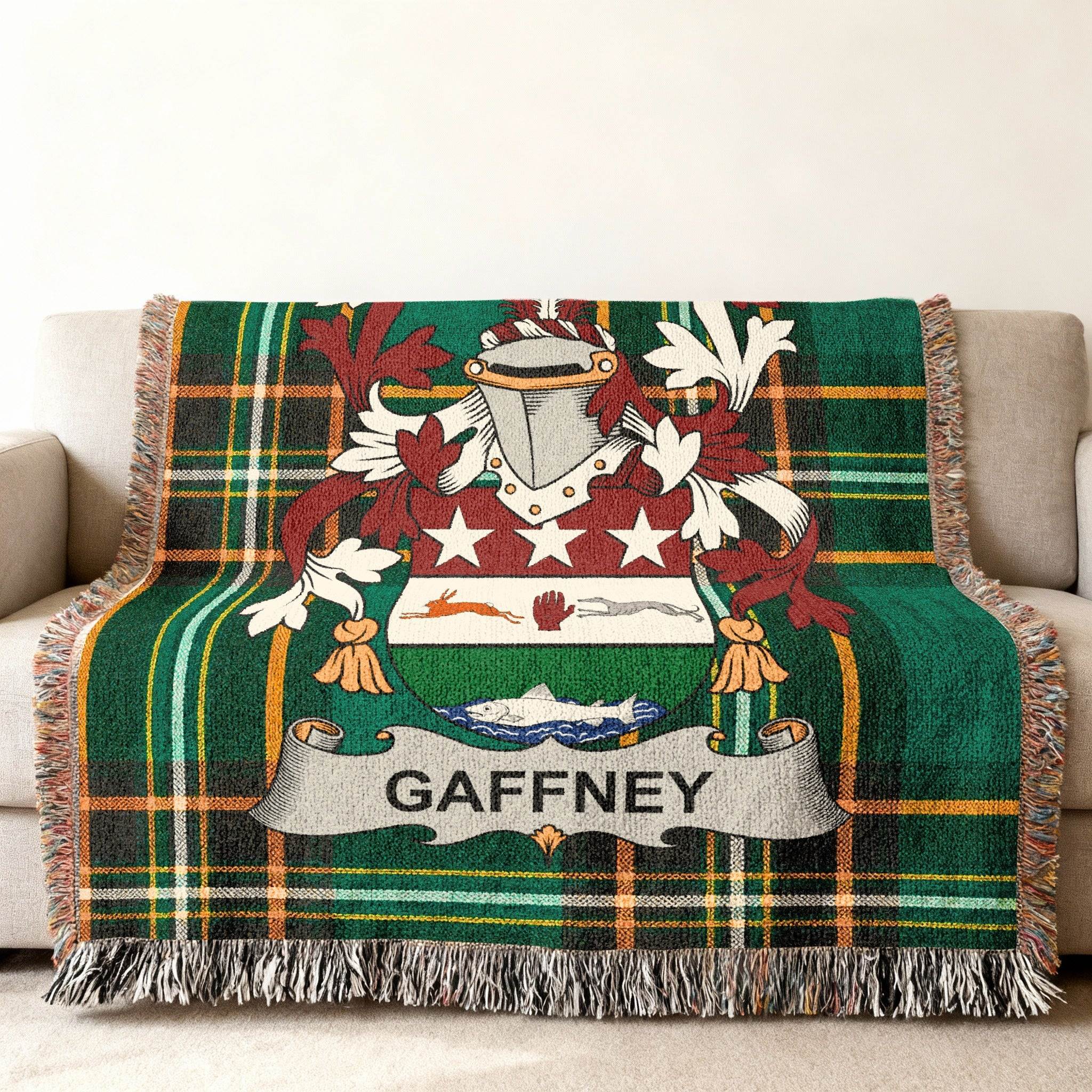 Green plaid throw blanket with Gaffney family crest centered on the fabric.
