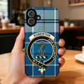 Clan Robertson tartan phone case — glossy blue plaid crest design, iPhone shown