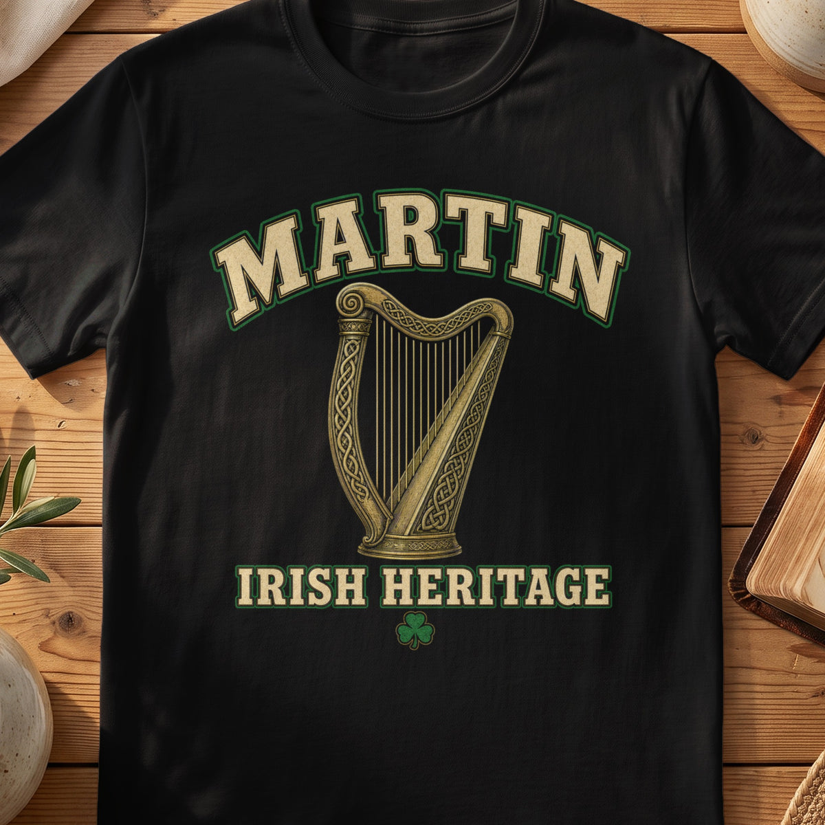 Martin Irish harp T-shirt in Black, with cream surname lettering, a gold-toned harp, green shamrock and “Irish Heritage” text.