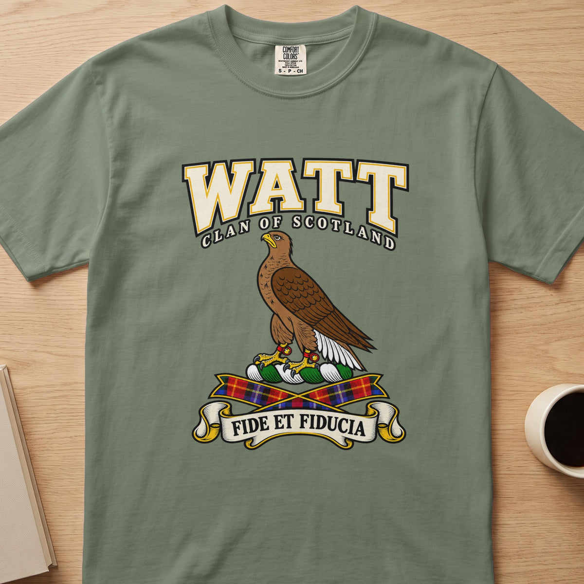 Watt clan T-shirt in sage green, front view with brown bird in profile