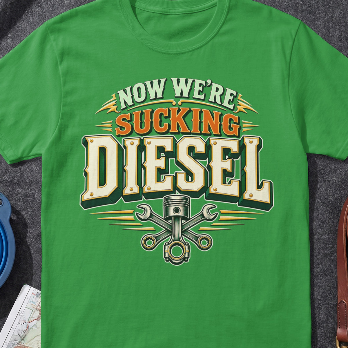 Now We're Sucking Diesel funny Irish T-shirt in Irish Green, flat-lay mockup