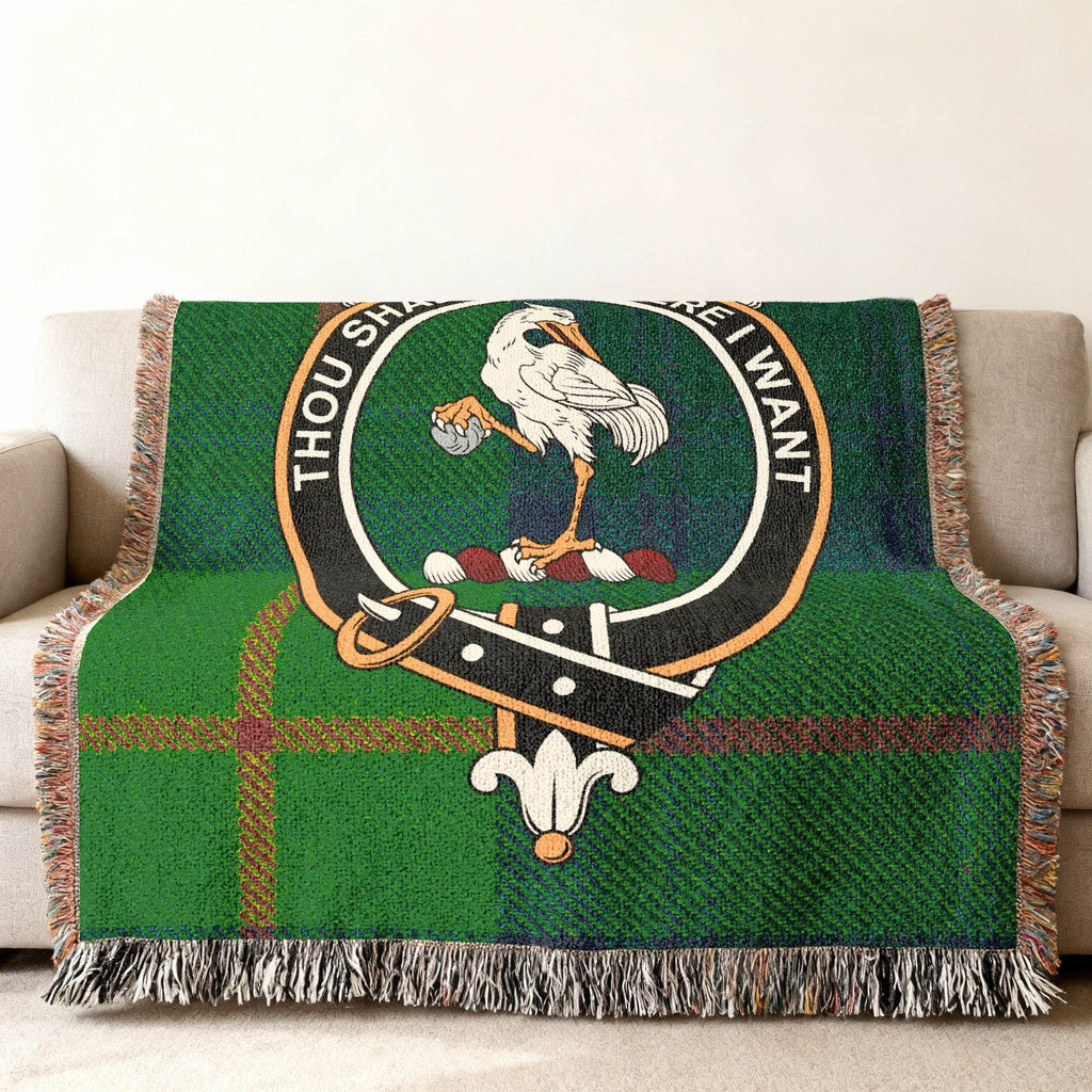 Cranstoun woven blanket draped over sofa — 60x50 size, fringe edges and tartan detail