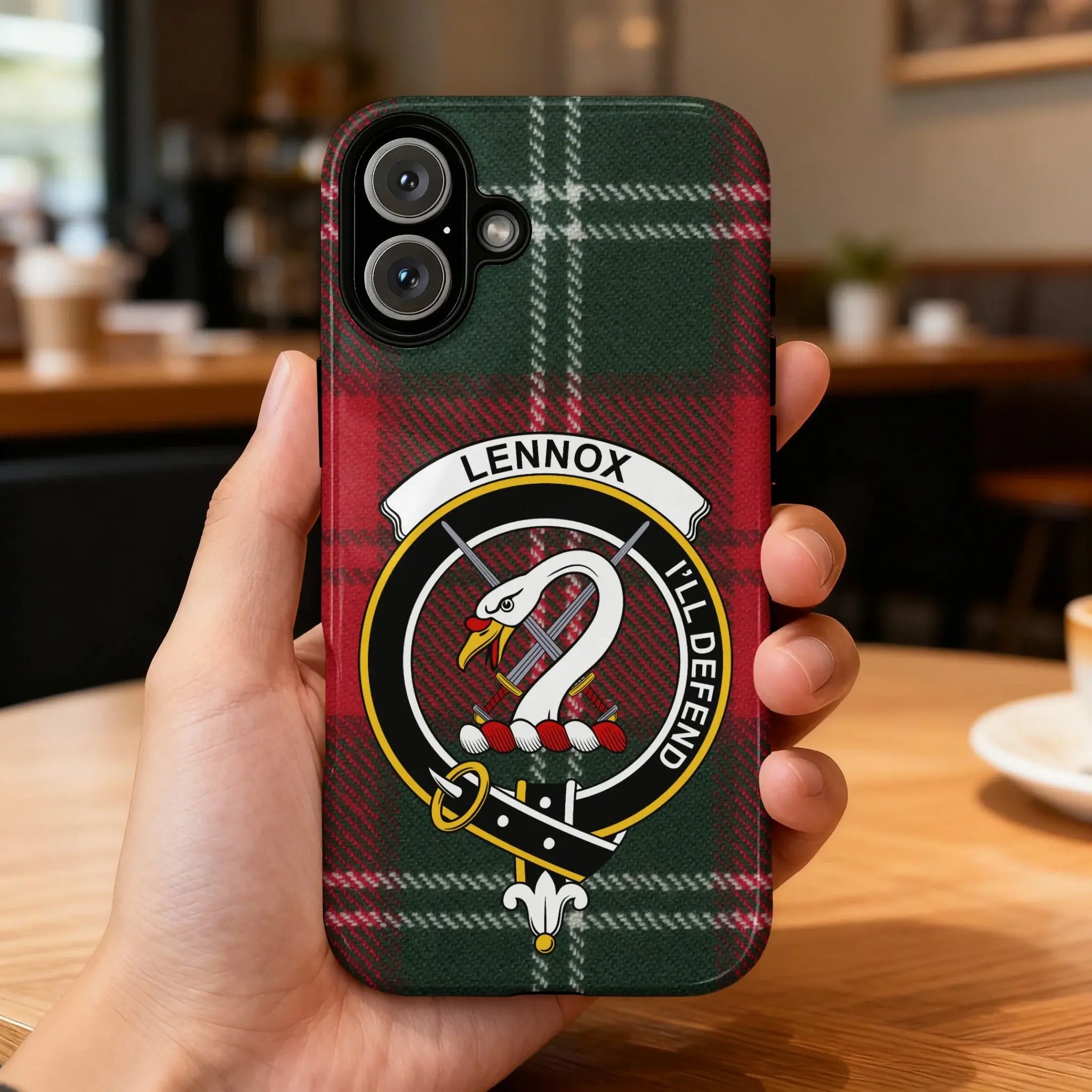 Clan Lennox crest phone case — iPhone fit shown, edge-to-edge tartan print with precise port cutouts