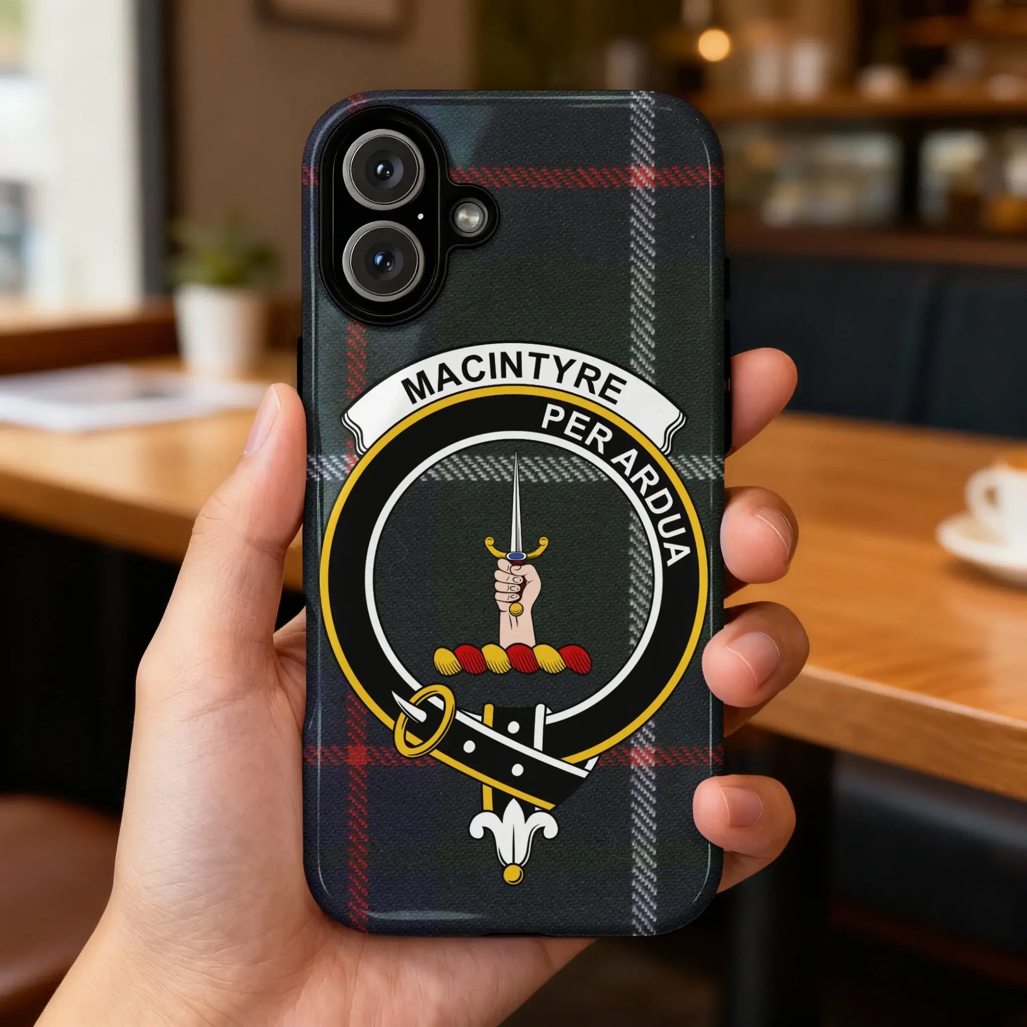 MacIntyre Per Ardua crest iPhone case with tartan design — full heraldic clan design visible