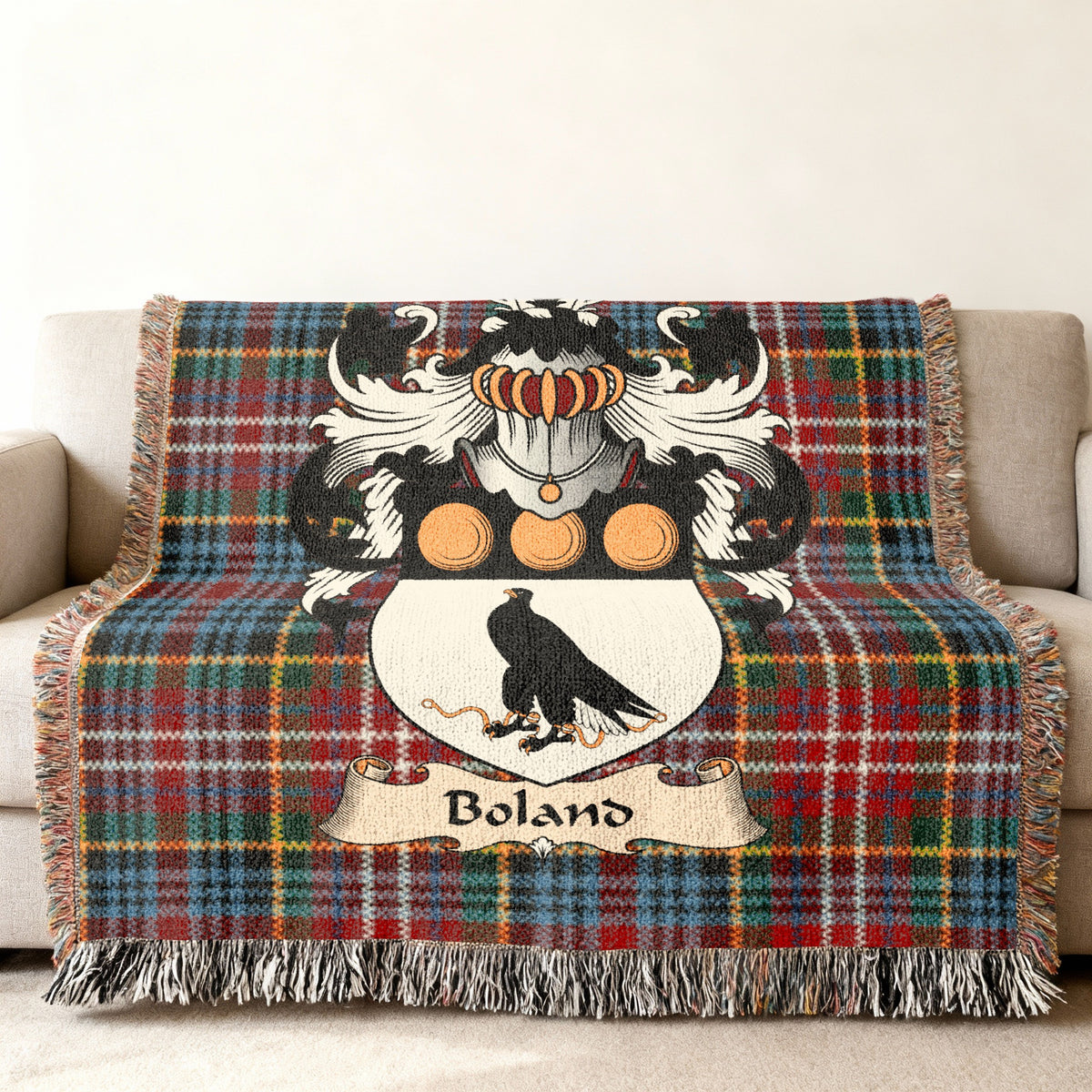 Boland Scottish family shield woven blanket on a Caledonia tartan background