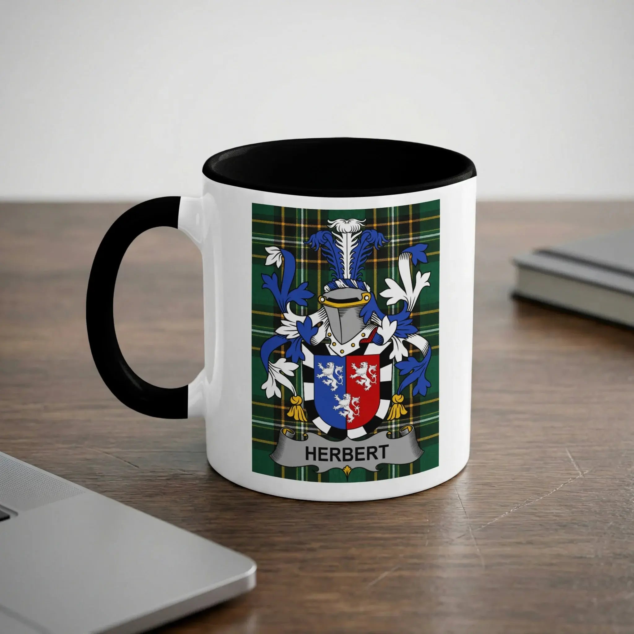White mug with black trim displaying the Herbert family crest.