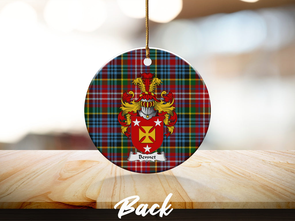 Round Bennet Scottish clan ornament with family crest on a Caledonia tartan background