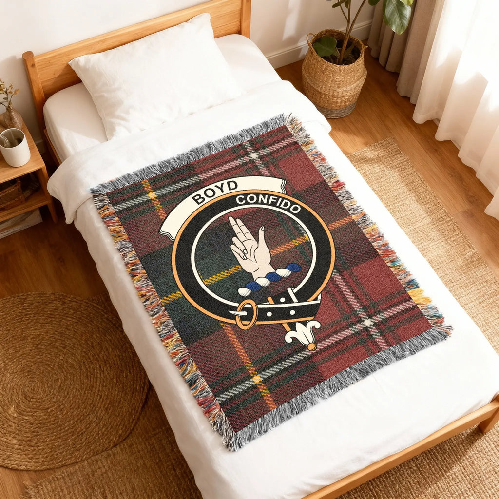 Boyd Confido tartan blanket folded — red and green woven plaid with clan crest