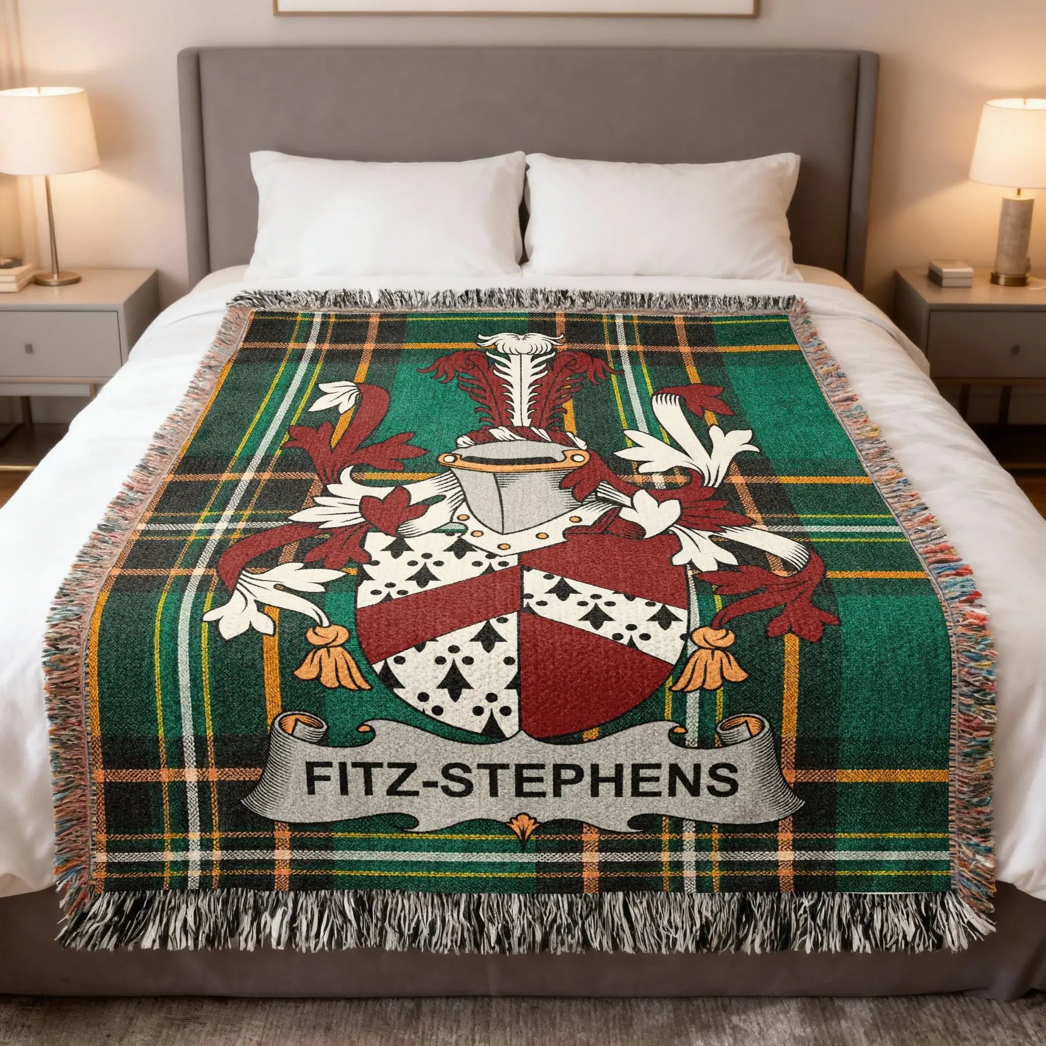 Plaid blanket with Fitz-Stephens coat of arms centered.