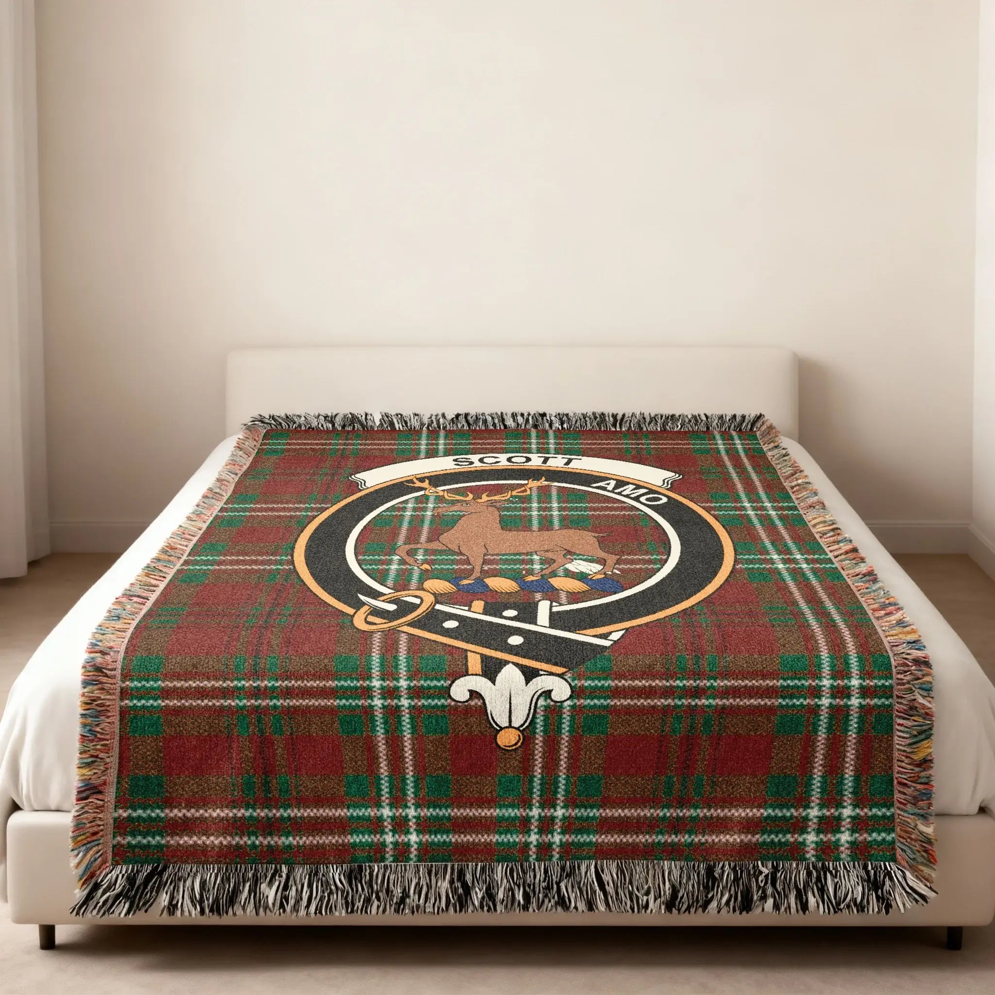 Scott amo tartan woven blanket folded — showing deer crest and plaid detail