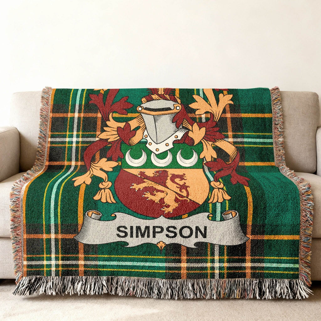 Green plaid throw blanket featuring a Simpson family crest.