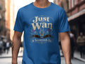 Blue t-shirt with text "Just the Wan a Scottish lie" and thistle graphics.