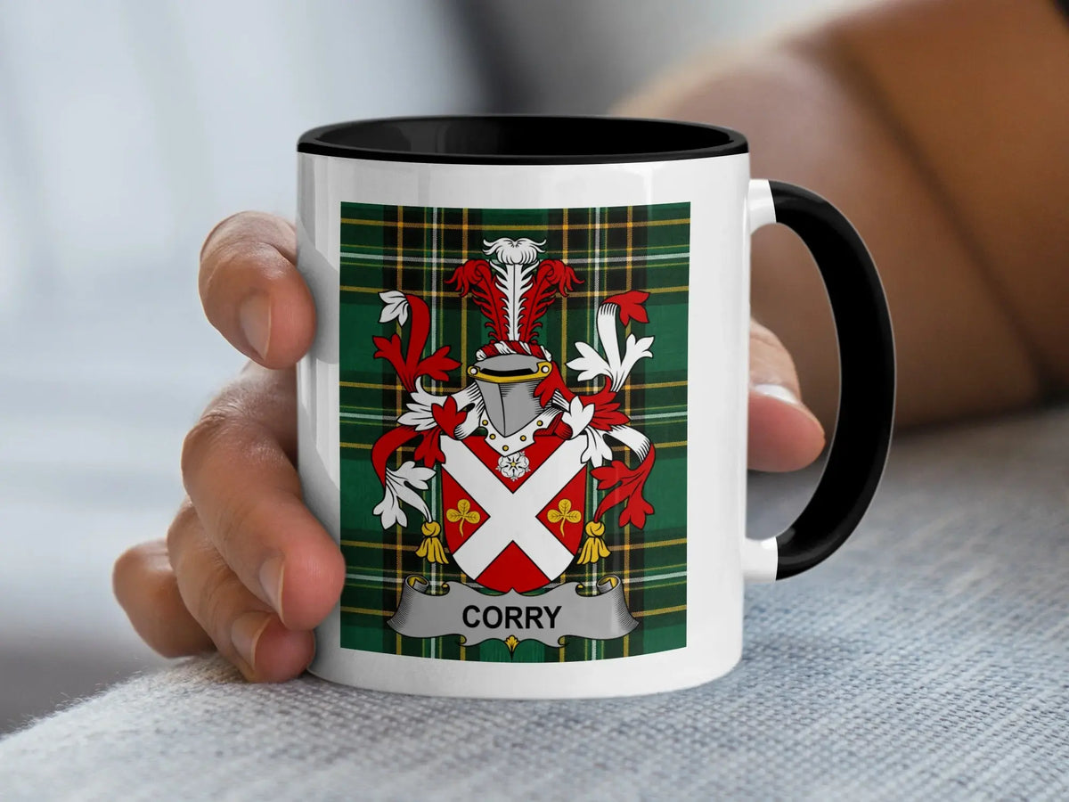 Corry Irish surname mug with family crest on an Irish National Tartan background.