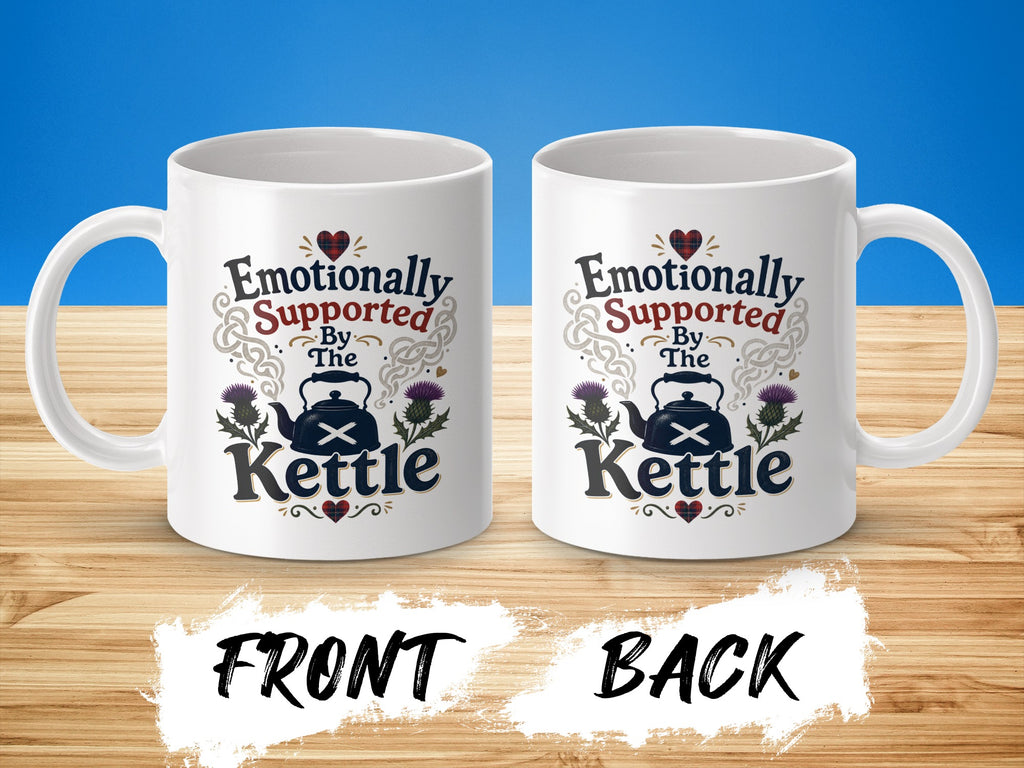 White mugs with "Emotionally Supported by The Kettle" and thistle design.