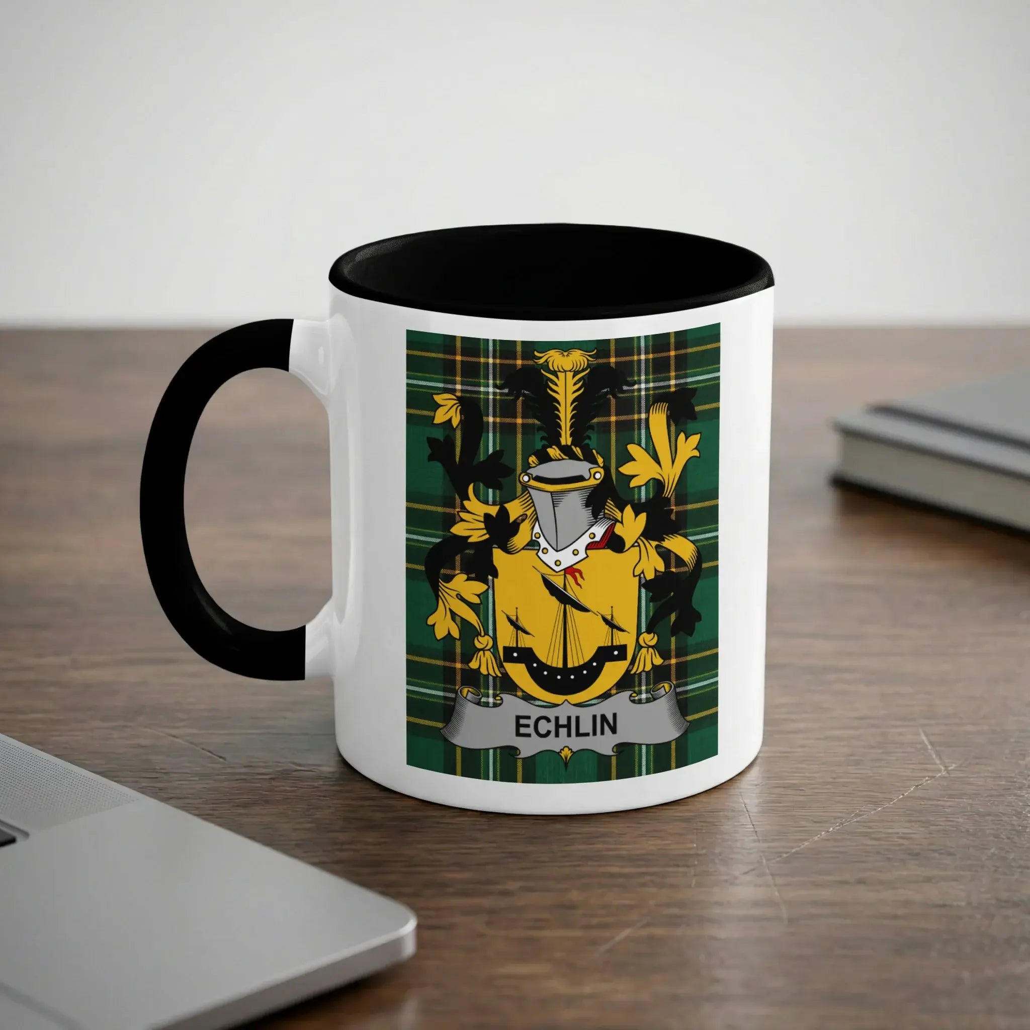 White mug with black rim and handle, featuring the Echlin family crest.