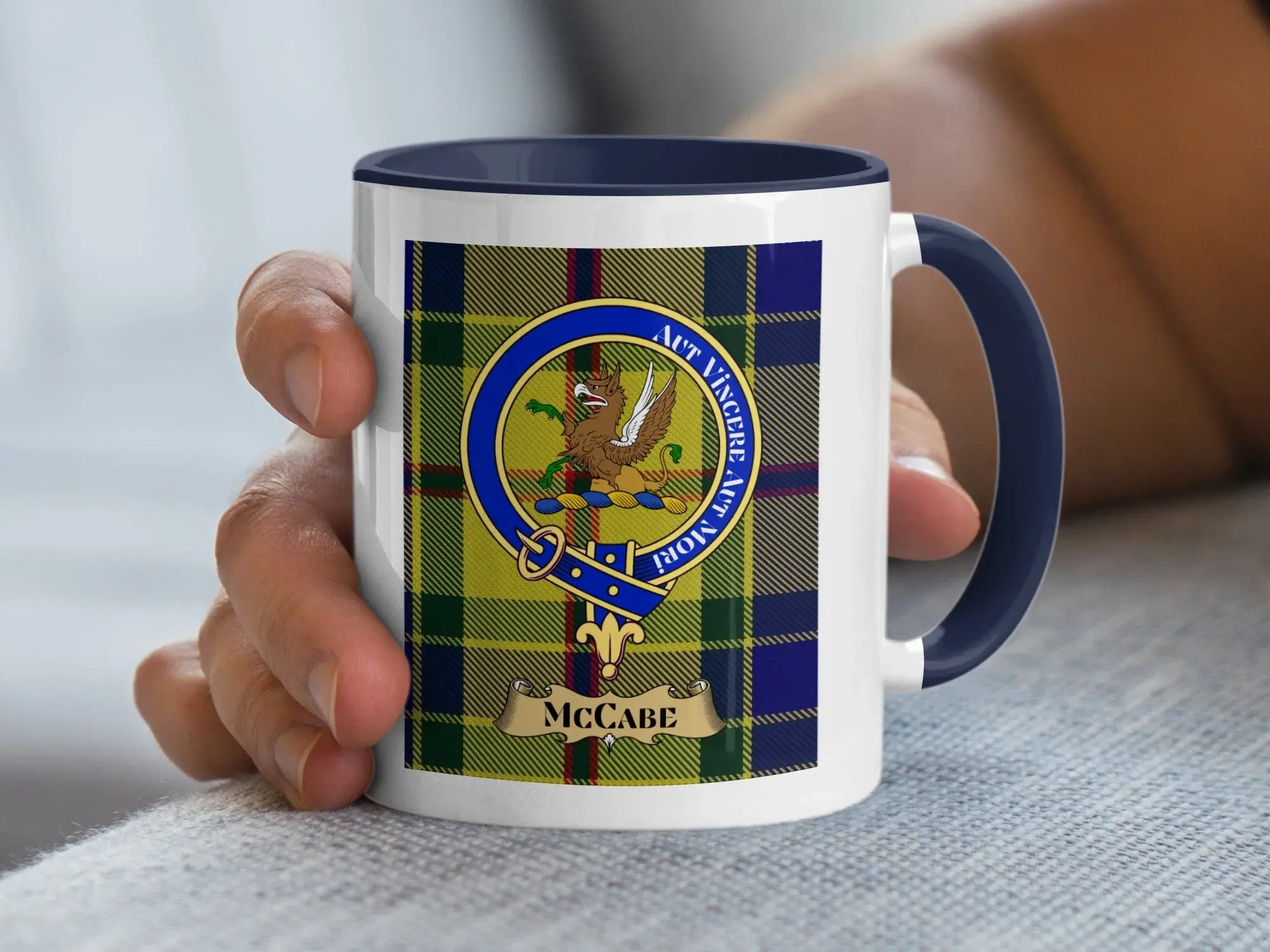 McCabe family crest coffee mug with a tartan-background design