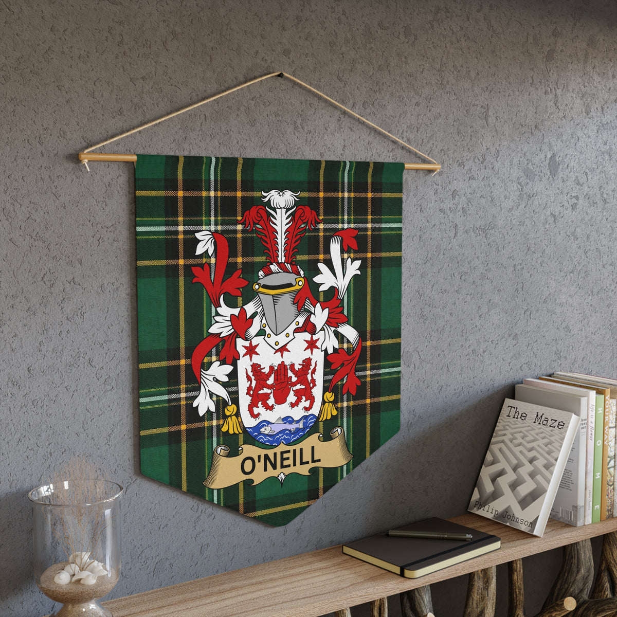 O'Neill family crest on a green plaid pennant hanging on a wall.