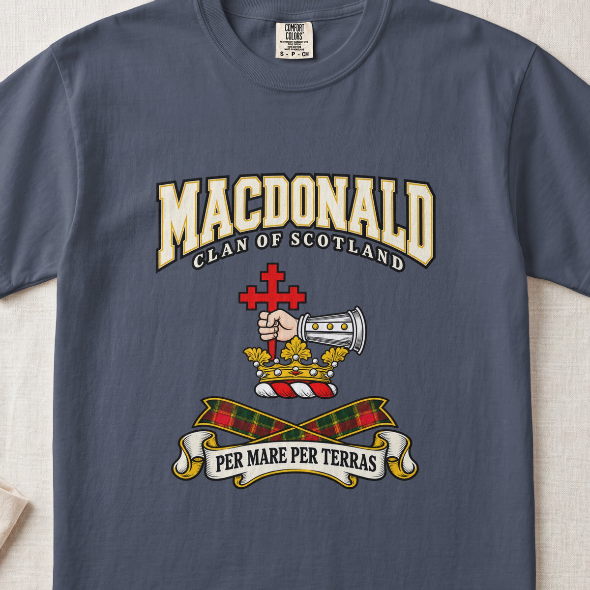 MacDonald graphic T-shirt in Midnight blue, front flat lay showing varsity lettering and armoured forearm with hand holding red cross.