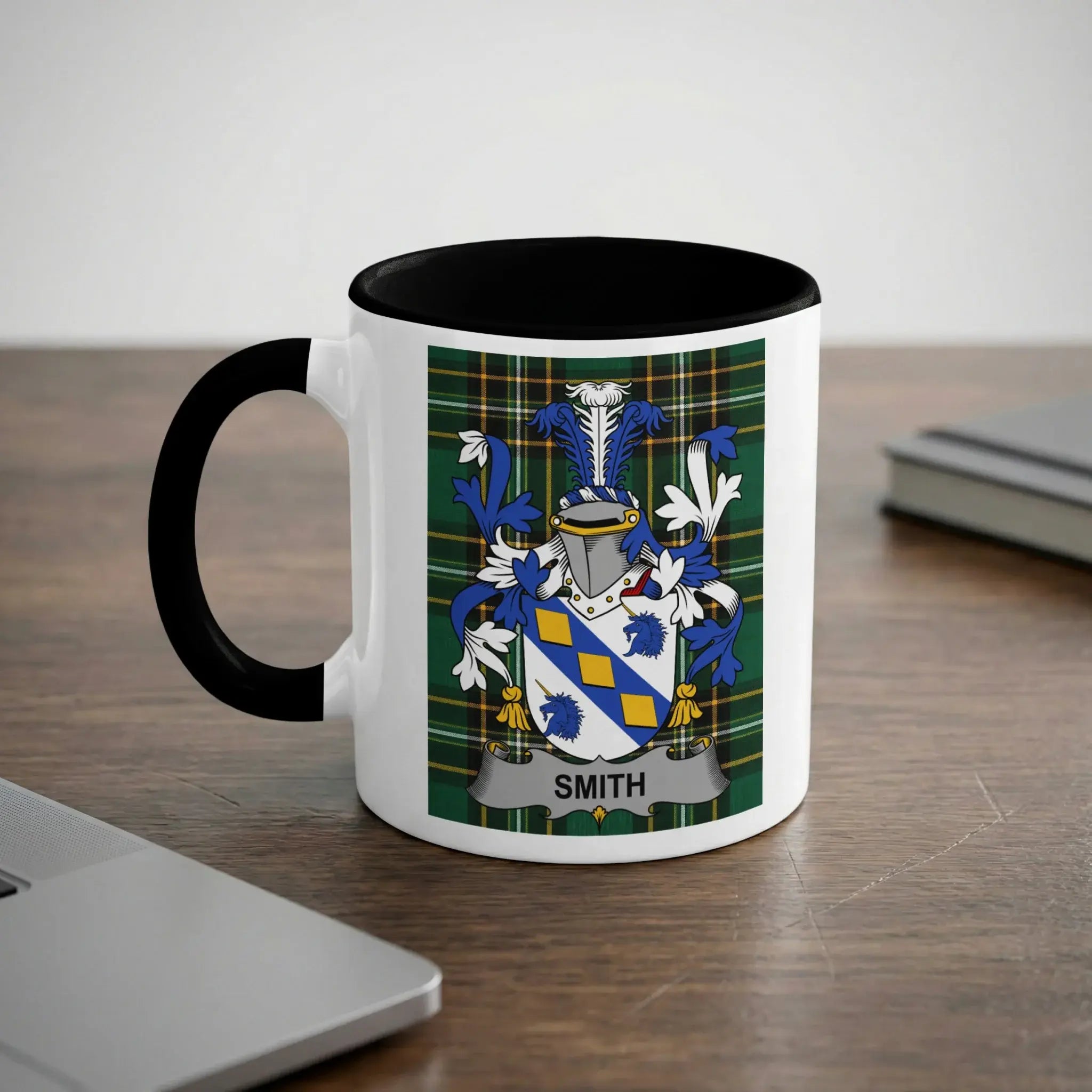 White mug with black rim and handle, featuring the Smith family crest on a tartan background.