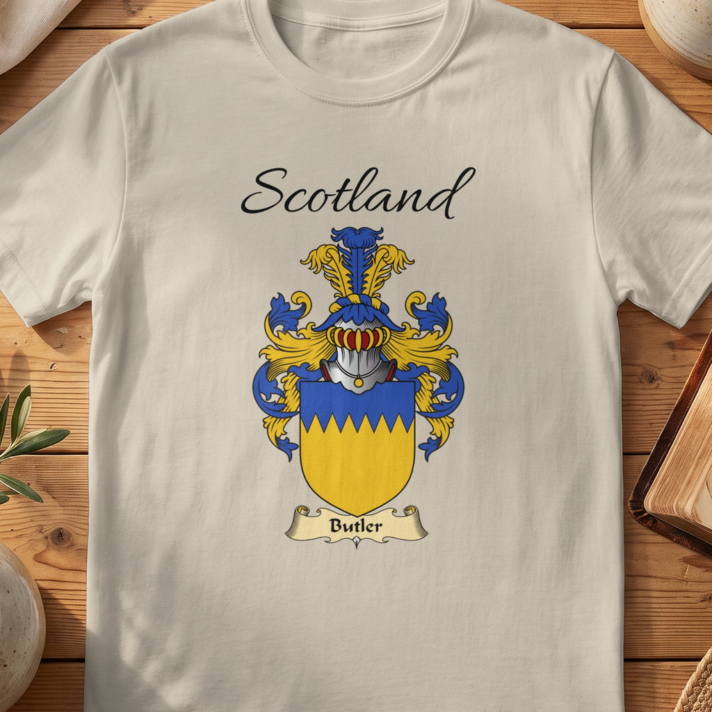 Sand Butler Scottish family shield T-shirt featuring a gold shield beneath a blue zigzag top band