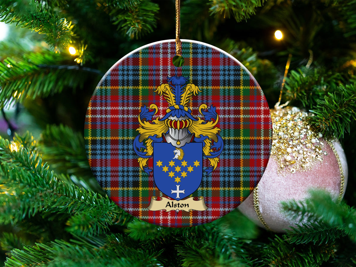 Alston Scottish clan ceramic ornament with family crest on a Caledonia tartan background, hanging on a Christmas tree