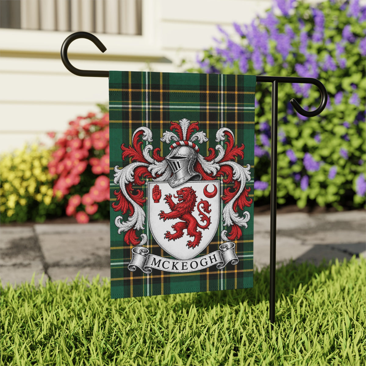 McKeogh Irish family crest garden flag on Irish National Tartan, garden view