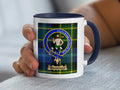 Wightman family crest coffee mug with a tartan-background design