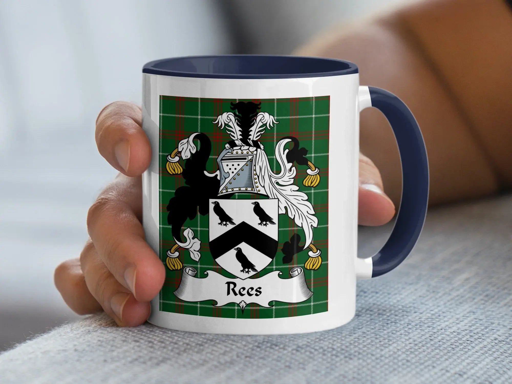 Rees Welsh tartan mug with navy accent showing three birds family crest on plaid