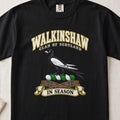 Walkinshaw Scottish clan T-shirt in Black, front view with a black and white magpie and motto design.