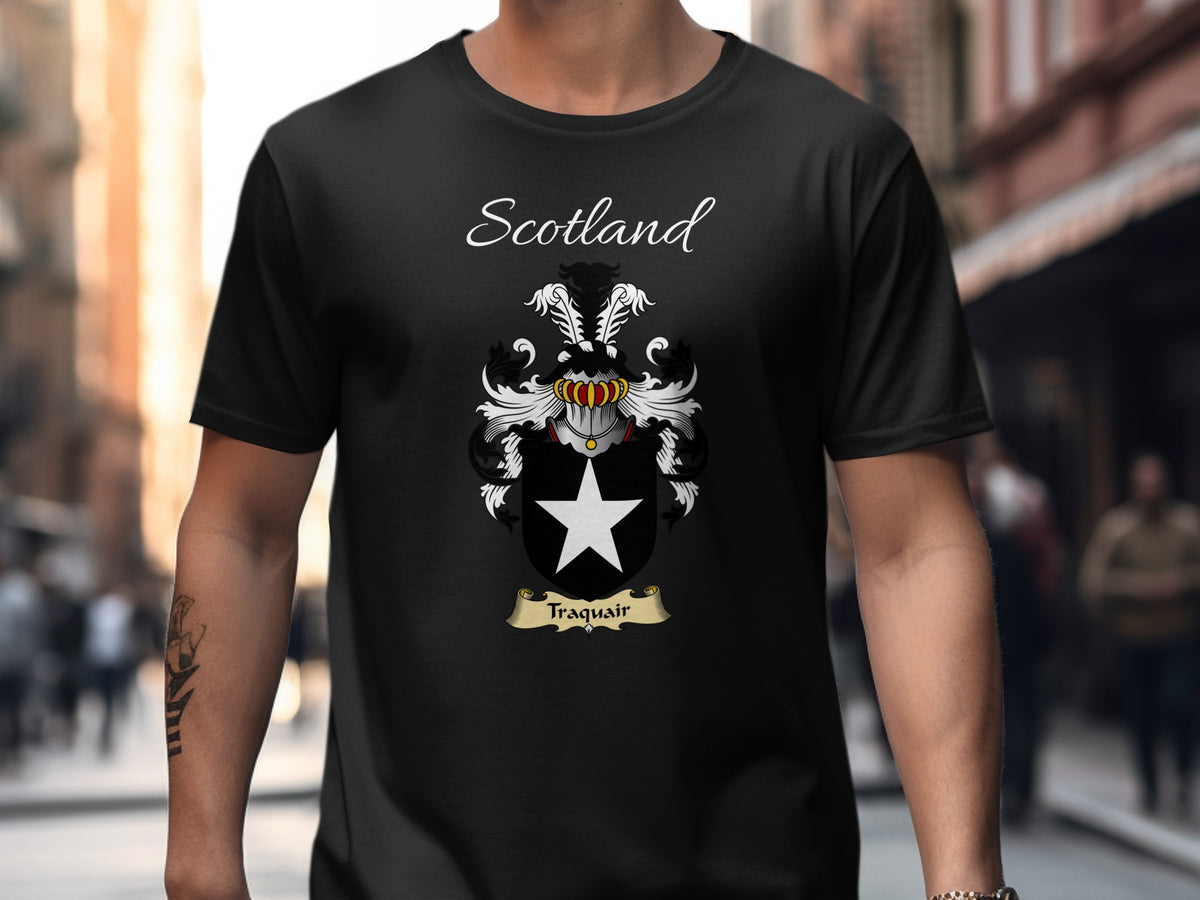 Model wearing the black Traquair Scottish surname T-shirt with family crest artwork.