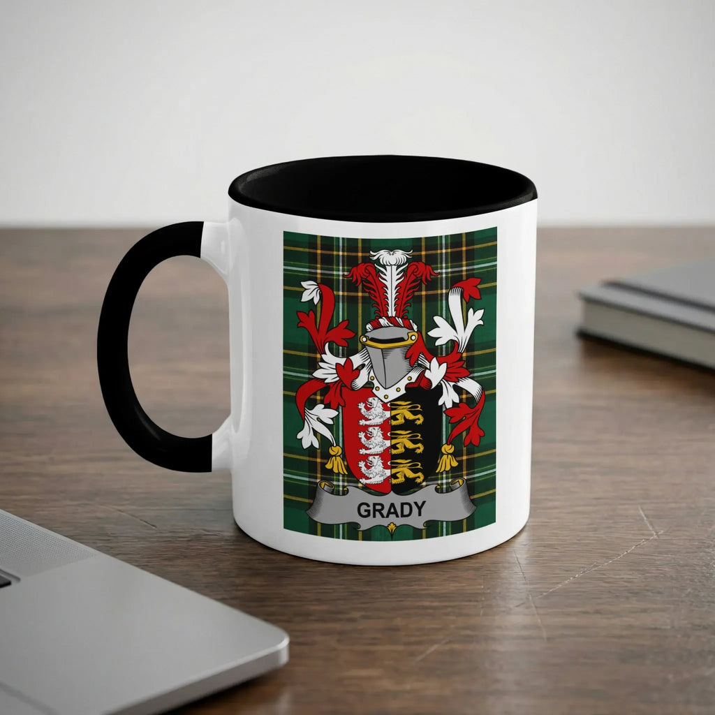 White mug with black rim and handle featuring the Grady family crest.