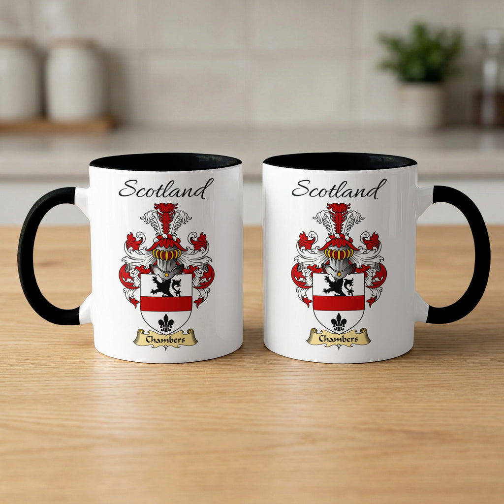 Pair of black-accent Chambers mugs showing the double-sided Scottish family shield design on white ceramic.