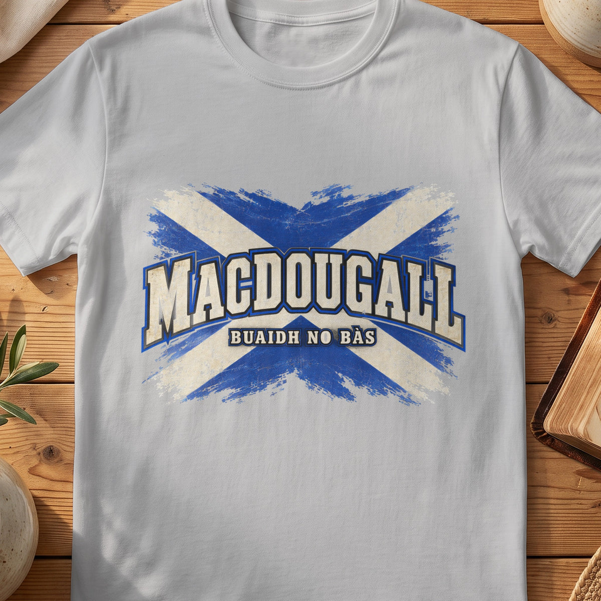 MacDougall Scottish Saltire T-shirt in Sport Grey, with distressed blue and cream flag and “Buaidh No Bàs” lettering.
