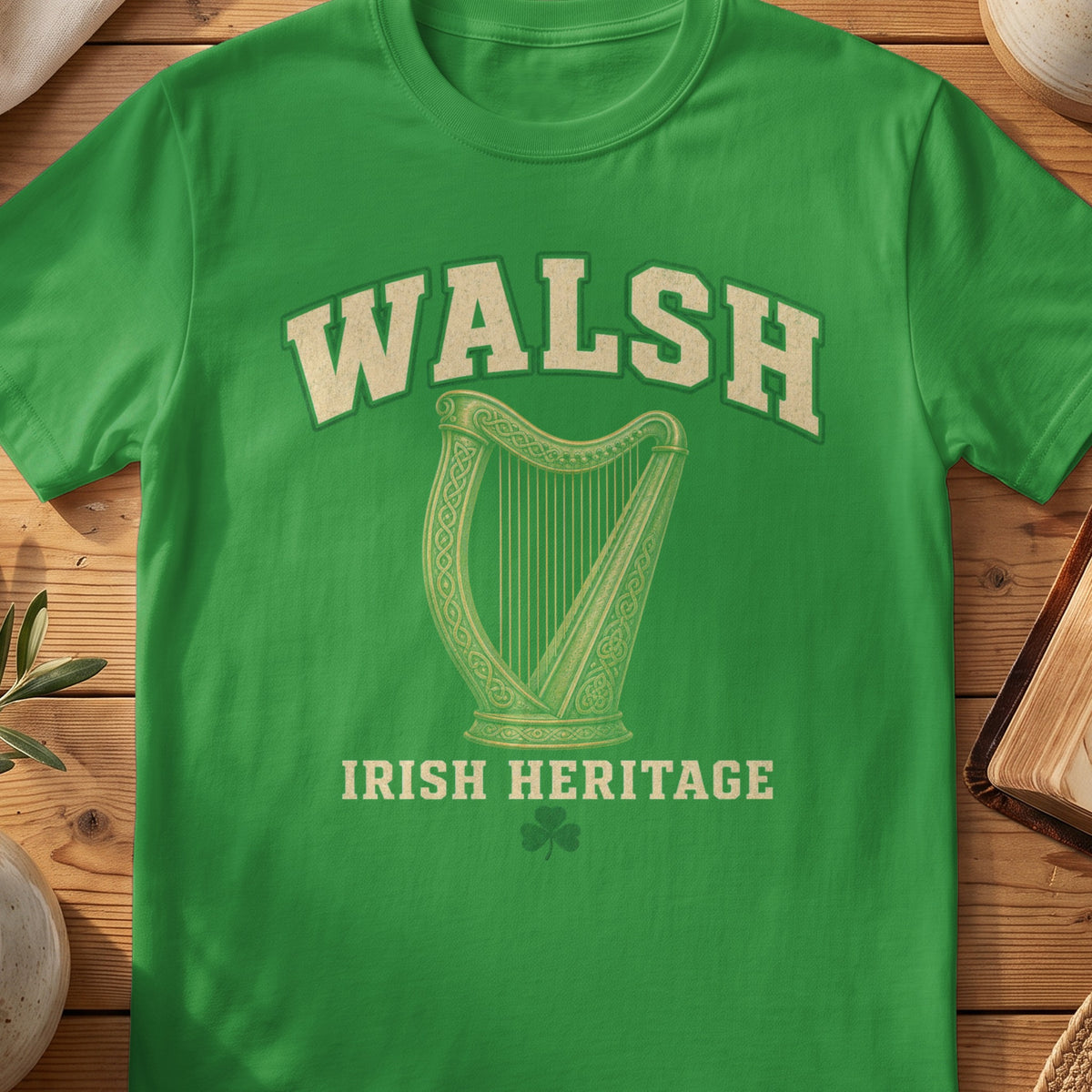 Walsh Irish harp T-shirt in Irish Green, with cream surname lettering, a gold-toned harp, green shamrock and “Irish Heritage” text.