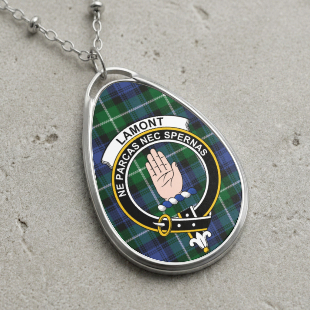 Lamont clan Scottish tartan necklace with clan crest and Ne Parcas Nec Spernas motto on tartan background