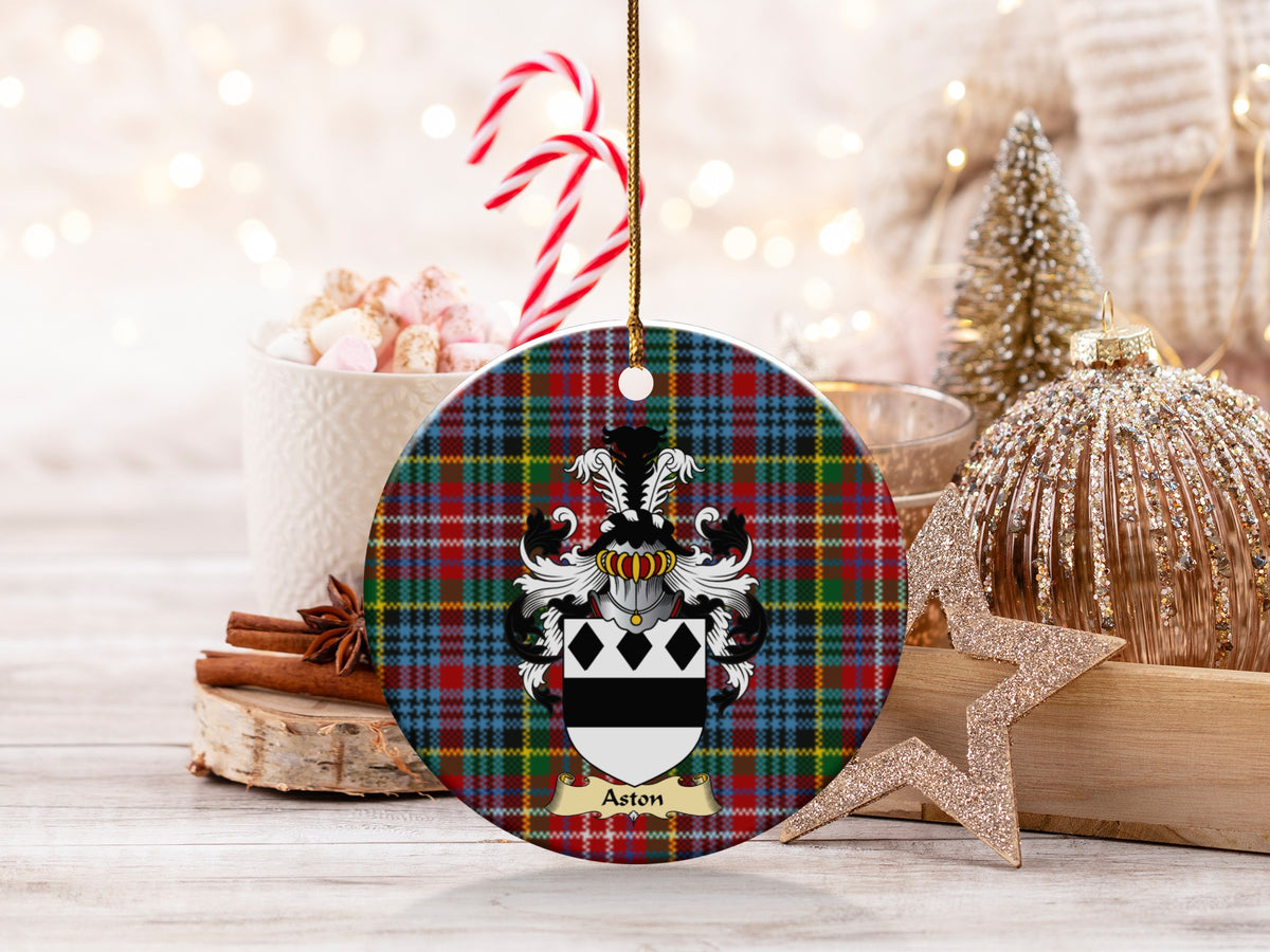 Aston family emblem ceramic Christmas ornament with Caledonia tartan background in festive holiday décor